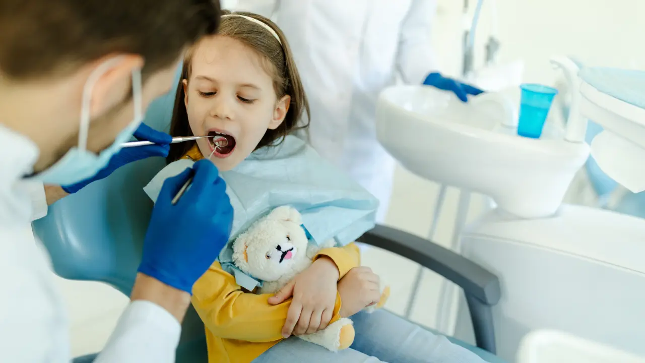 Young child during routine dental checkup at clinic
