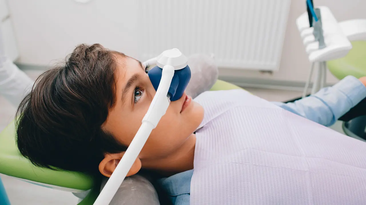 Child preparing for anesthesia-assisted dental treatment at a pediatric dental clinic in Dubai